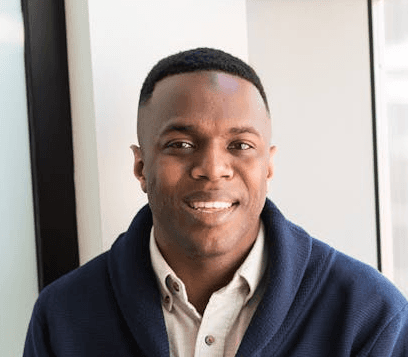 Man smiling in an office